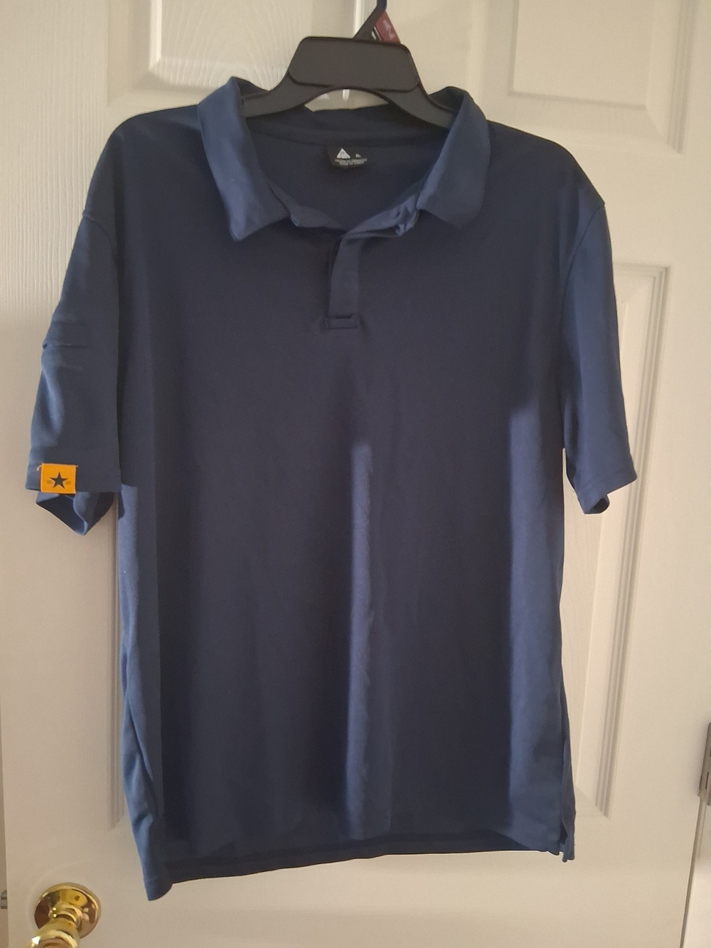 Men's Dark Blue Polo with Subtle Sleeve Patch
